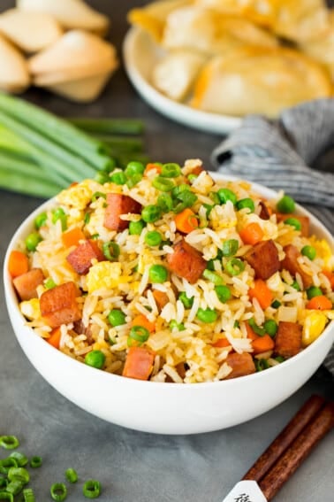 A serving bowl filled with Spam fried rice.