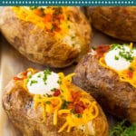 These oven baked potatoes are perfectly cooked with a crispy outside and fluffy inside.