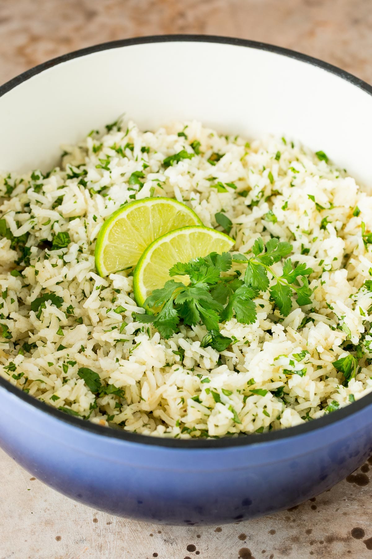 A blue pot filled with cilantro lime rice.