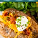 These air fryer baked potatoes are whole Russet potatoes that are coated in olive oil and salt, then air fried until crispy on the outside and tender on the inside.