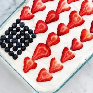 An image of a tiramisu decorated with berries to look like an American flag.