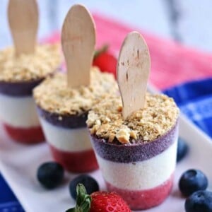 An image of a red, white, and blue cheesecake popsicle.