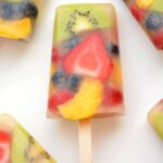 An image of a popsicle filled with different fruit.