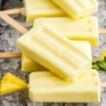 An image of several pineapple Dole Whip flavored popsicles.
