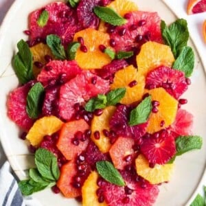 An image of a salad made with citrus like oranges and grapefruit.