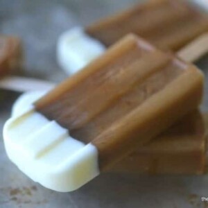 A picture of three iced coffee popsicles.