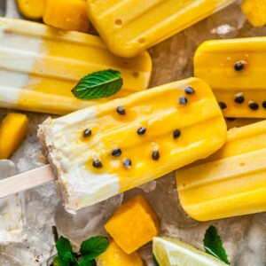 An image of mango, passionfruit and coconut popsicles.
