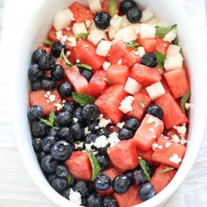 A picture of salad made with blueberries, watermelon and jicama.