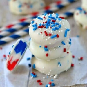 An image of a stack of three red, white and blue candies.