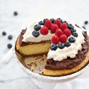 An image of a cake pie with chocolate mousse and berries.