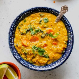 An image of a bowl of golden lentil soup.