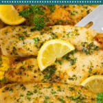 This baked tilapia is flavored with garlic, butter, herbs and seasonings, then cooked to tender and flaky perfection.