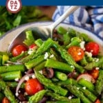 This asparagus salad is tender asparagus, tomatoes, olives, red onion and radishes, all tossed in a homemade dressing and topped with feta cheese.