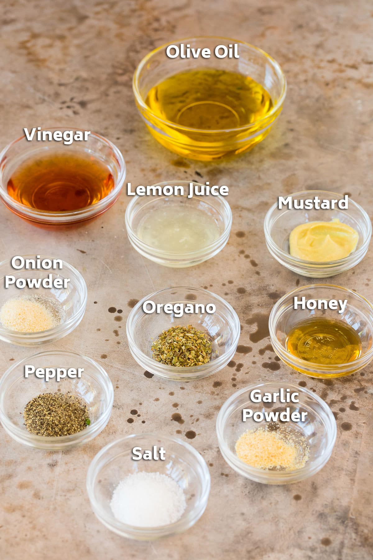 Bowls of salad dressing ingredients.