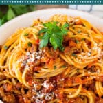 This slow cooker bolognese sauce is a blend of ground beef, bacon and vegetables, all simmered together with tomato sauce in a crock pot.