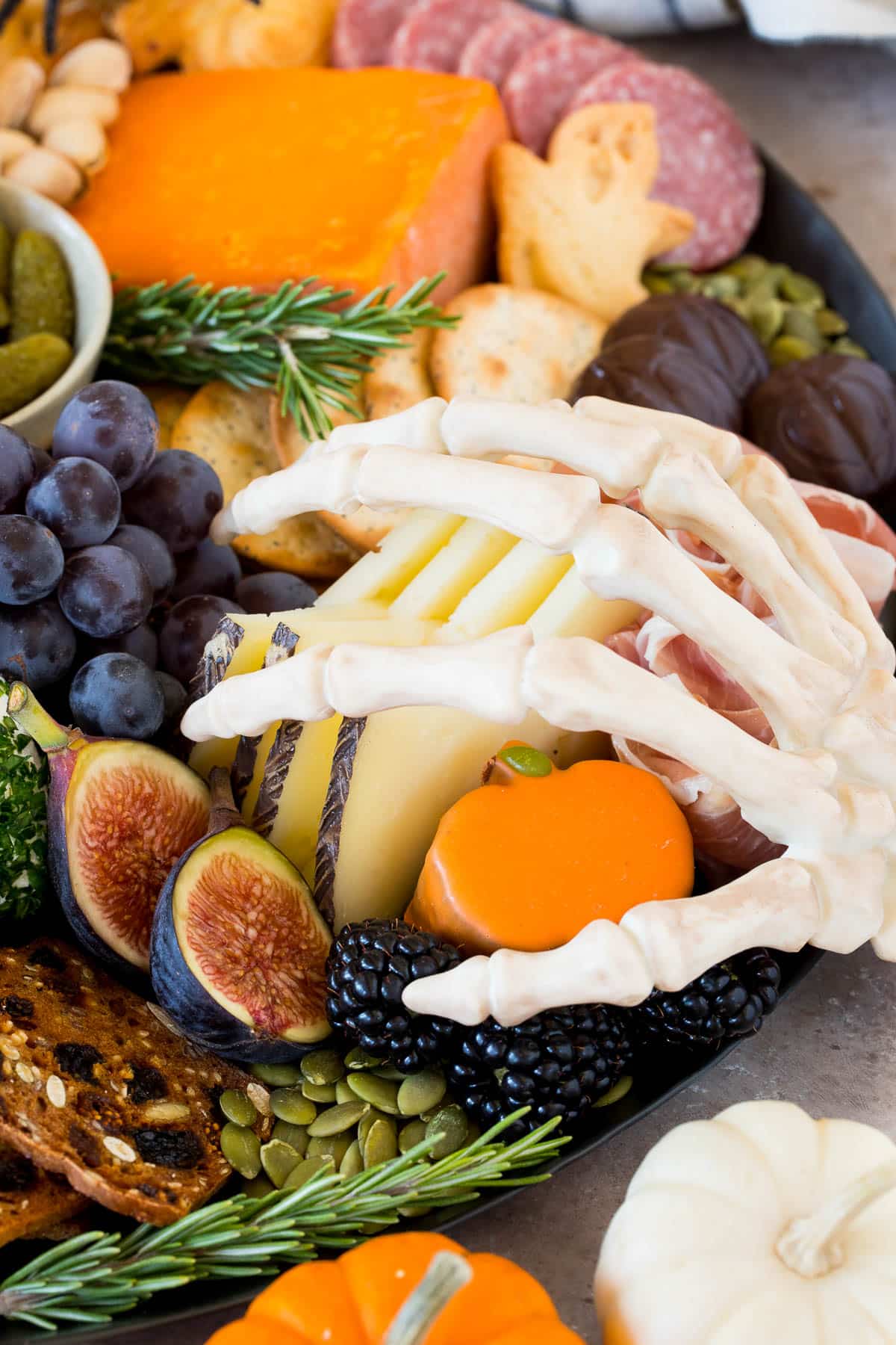 Fruits and cheeses on a party platter.