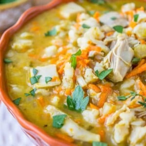 An image of soup made with turkey and barley.