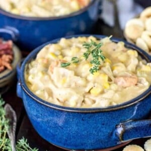 An image of turkey chowder in blue bowls.