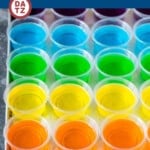 This Jello shots recipe contains fruit flavored gelatin and vodka, which are mixed together, poured into cups, then chilled until firm.