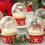 An image of snow globe cupcakes on a table.