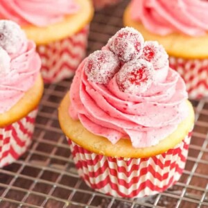 An image of a sparkling cranberry white chocolate cupcake.