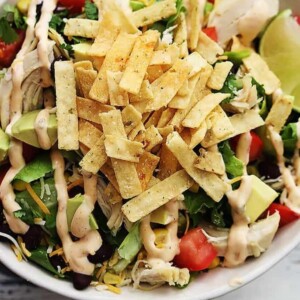 An image of a taco salad made with turkey in a bowl.