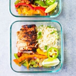 An image of a chipotle chicken fajita bowl in a glass container.