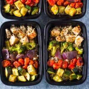 An image of containers of roasted chicken and veggie meals.
