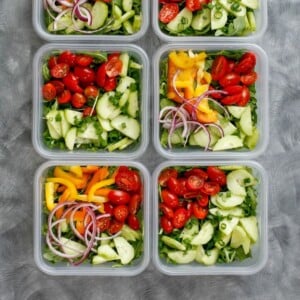 A picture of several bowls of salads.