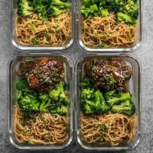 A group of bowls of ginger soy glazed chicken meals.