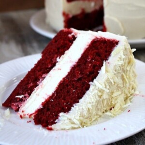 A picture of red velvet cheesecake on a plate.
