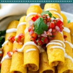These chicken taquitos are stuffed with seasoned shredded chicken and cheese, then baked or fried to crispy perfection.