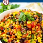 This cowboy caviar is a colorful and hearty dip that's loaded with beans, black eyed peas, avocado and veggies, all tossed in a zesty homemade dressing.