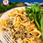 This ground beef stroganoff is a mix of hamburger meat and mushrooms, all in a creamy sauce with egg noodles. A comfort food classic that's easy to make and is always a big hit with family and friends.