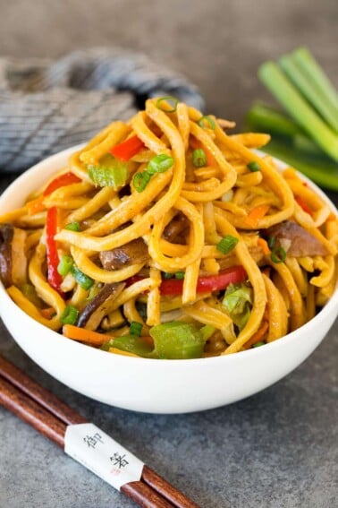 A serving bowl filled with vegetable lo mein.