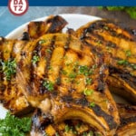 This pork chop marinade is a blend of garlic, herbs, olive oil, soy sauce, brown sugar and Dijon mustard.