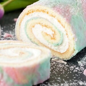 An image of a sliced watercolor roll cake.