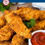 These air fryer chicken tenders are fresh chicken tenderloins coated in breadcrumbs, spices and parmesan cheese, then air fried until golden brown and crispy.