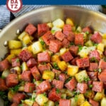 This corned beef hash is a blend of diced corned beef, potatoes and onions, all cooked together until golden brown and tender.