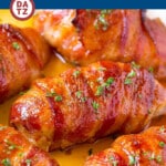 A pan of bacon wrapped chicken which is chicken breasts seasoned with brown sugar and spices, then wrapped in bacon and baked until caramelized.