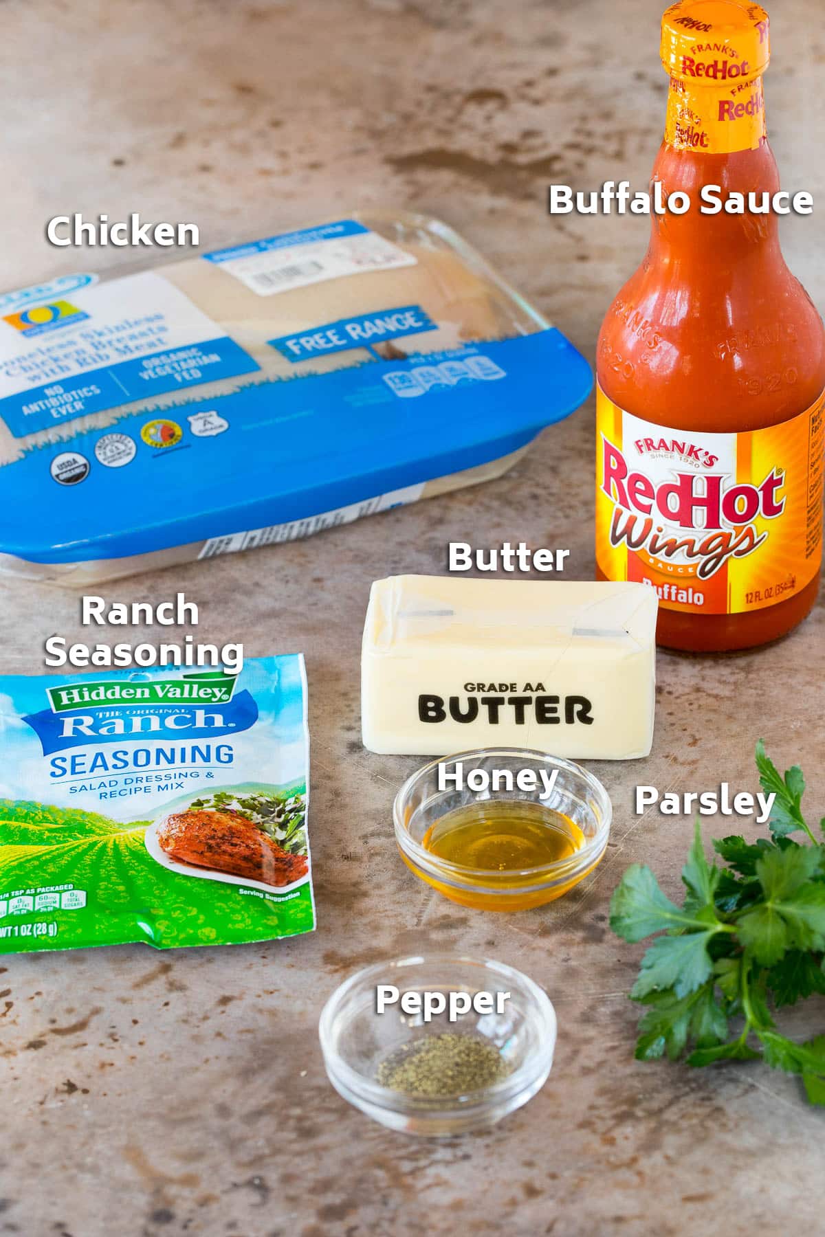 Ingredients including chicken, hot sauce, butter, honey and seasonings.
