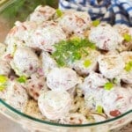 A bowl of creamy dill potato salad.