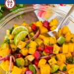 This mango salad is a zesty blend of diced fresh mango, avocado, red onion and bell pepper, all tossed together in a homemade dressing.