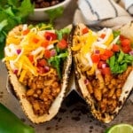 Ground turkey tacos with assorted toppings.