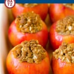 A baking pan of tender baked apples with oatmeal brown sugar filling.
