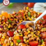 This black eyed pea salad features assorted fresh vegetables, tender black eyed peas and herbs, all tossed in a zesty homemade dressing.