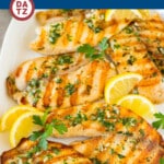 This grilled tilapia is fish fillets coated in a zesty marinade, then cooked on the grill to tender perfection.
