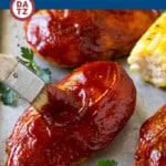 This smoked chicken breast is boneless skinless chicken that's coated in a homemade BBQ seasoning, smoked to tender and juicy perfection, then brushed with BBQ sauce.