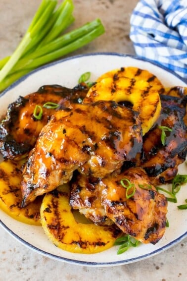 Chicken coated in teriyaki marinade that has been grilled, served with pineapple.