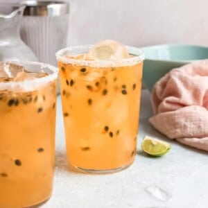 An image of two passionfruit palomas.